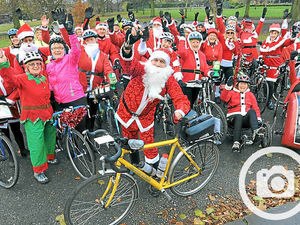 Supporting image for story: Santas and elves ride out in Stourbridge charity bike ride