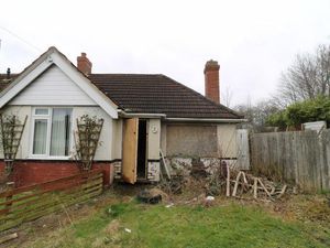 Supporting image for story: A taped-off toilet and boarded-up windows: See inside fixer-upper bungalow going under the hammer