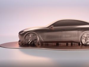 Supporting image for story: BMW Concept i4 teaser sets the stage for Tesla Model 3 rival