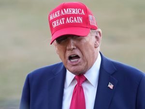 Supporting image for story: Trump signs order designating English as official language of the US