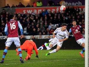 Supporting image for story: Swansea 1 Villa 0 - Report and pictures
