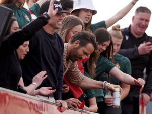 Supporting image for story: GALLERY: Ryan Reynolds & Rob McElhenney join thousands of fans for Wrexham open top bus parade