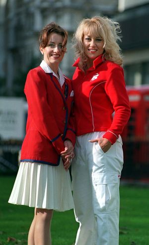 REDCOATS New uniform...Butlin's holiday camp Redcoats, Yvonne (left) and April model Redcoats uniforms, Yvonne's uniform dates from the 1940's and April is wearing the new look uniform created by celebrity designer Jeff Banks which was unveiled today (Wednesday) at the Hippodrome in London. Photo by Neil Munns/PA.