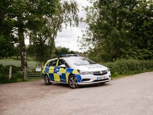Supporting image for story: Police remain at scene after human remains found in river