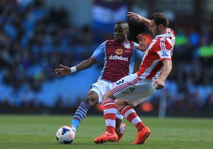 Stoke City's Erik Pieters (right) and Aston Villa's Yacouba Sylla battle for the ball