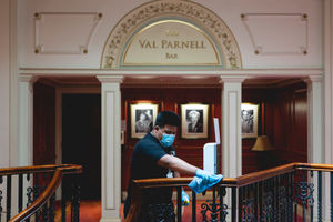 Staff cleaning handrails at the London Palladium