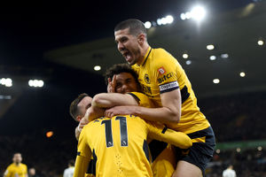 Wolves players celebrate with Trincao after he makes it two (Getty Images)