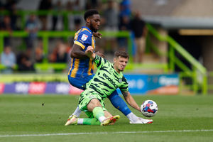 Chey Dunkley of Shrewsbury Town and Josh March of Forest Green Rovers (AMA)
