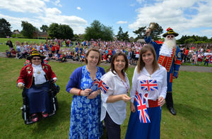 Pupils from Woodfield Infant School, and St Georges Junior School, with (front left-right) consort Sue Wood, headteacher Beck Preece, executive headteacher Sharon Munro, headteacher Kelly Lee, and town crier Martin Wood
