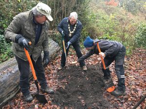 Mayor Paul Gouldbourne with council staff preparing the ground