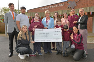 Tettenhall Wood School came in fourth in our Cash for Schools competition. Pictured: head of school Helen Masters with the school council and sponsors.