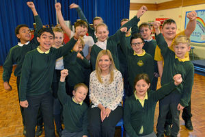 Head Stacey Beale celebrates with pupils at St Luke's Catholic Primary School, Trench