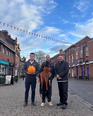 Jamie Richards (AED Donate), Ed Stant (Stone Traders' Group) and Grant Pullen (Granville's) get ready for the family Halloween Festival