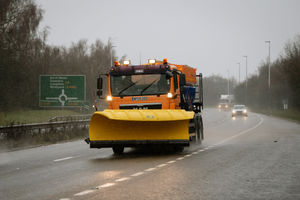 A snow plough heads out across Shrewsbury on Monday