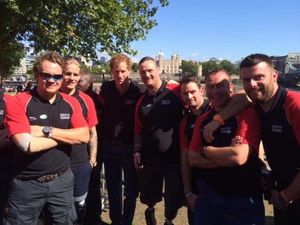 Sapper Clive Smith (right) next to Prince Harry.