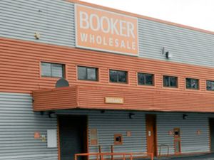 Supporting image for story: Booker sales rise ahead of merger