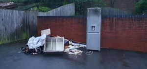 Appliances could be seen outside the house with burn marks on them