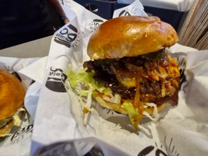 The burgers are smashed burgers with plenty of toppings