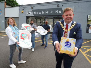 Supporting image for story: New shop donates funds to Telford baby bank as it celebrates opening