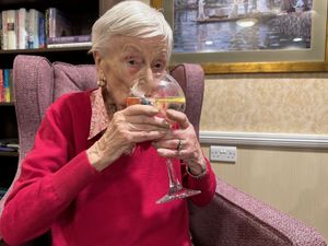 Elizabeth with her favourite beverage - a gin and tonic!