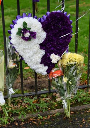 Floral tributes at the scene of the murder in Lilleshall Crescent, Wolverhampton.