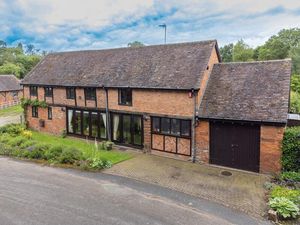 Supporting image for story: For sale: Stunning Grade II listed barn conversion with 'tranquil countryside views'