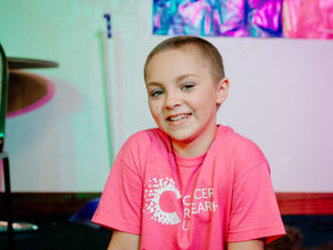 Supporting image for story: Brave Courtney, 10, undergoes head shave for Cancer Research UK