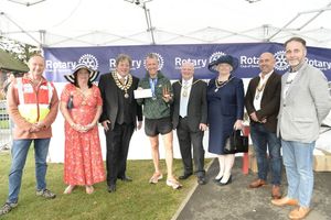The fastest male finisher Richard O'Sullivan with guests at the event including the Mayor of Lichfield Robert Yardley, Mayoress Jayne Marks, Lichfield District Council Chairman Barry Gwilt and Tamworth MP Christopher Pincher.