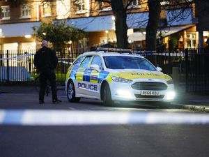 Police at the scene of the fatal shooting in Paradise Road, Stockwell