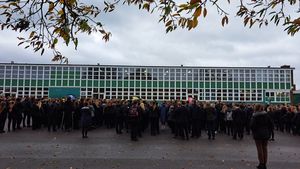Wolgarston staff and students gathering outside to pay their respects on Armistice Day.