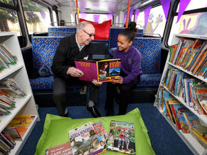 Supporting image for story: Goodyear workers stop off to help school pupils' love of reading with library bus 