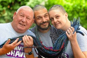 After having their hair shaved off for charity, left to rightm Ian Cargill, with son Andy Cargill, and Andy's wife Ally Cargill