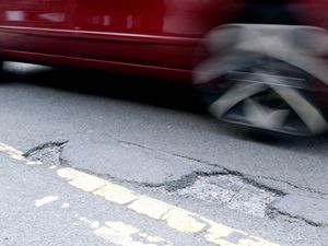 Supporting image for story: Government to fine utility companies for poor pothole repairs