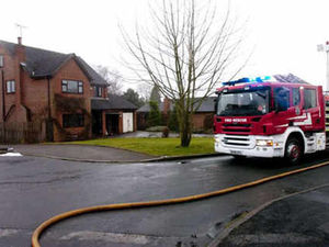 Supporting image for story: Fire crews rescue dog from house blaze
