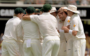 Australia's Ryan Harris (second right) celebrates taking the wicket of England's Kevin Pietersen (not pictured)