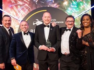 Supporting image for story: Air ambulance volunteer wins prestigious award for efforts over last ten years