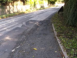 Damage caused by flooding near the entrance to Moor Park School