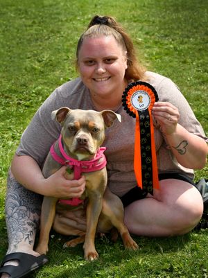 CANNOCK COPYRIGHT NATIONAL WORLD TIM THURSFIELD -09/08/25
Hednesford Summer Festival at Hednesford Park.
Fraja Cox and her dog Aurora who won the Best Legs category.