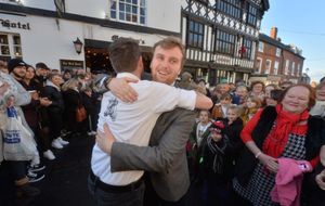 Rob Filbrandt of the Bull (left) congratulates Jack Adams-Taylor from the Feathers on the win.