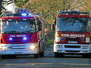 Supporting image for story: Fire crews battle three fires and rescue pensioner from lift