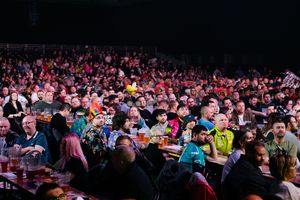 Fans enjoying the darts