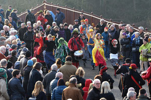New Year's Day crowds watch The Ironmen & Severn Gilders dancing on the world's first iron bridge in Ironbridge. Picture: Dave Bagnall
