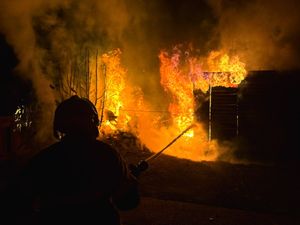 Supporting image for story: Firefighters battle to stop shed blaze spreading to Market Drayton bungalows