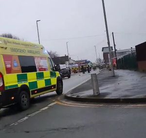 The collision left the road blocked and emergency services teams working at the scene. Photo: Sadie Yardley