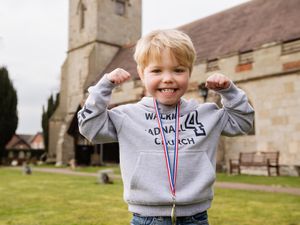 Supporting image for story: Little boy with big heart raises more than £1,000 for church with sponsored walk