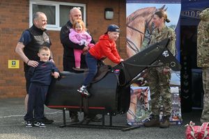 Fallings Park, Wolverhampton and Royal Artillery open day event. The Kings Troops and Joanna Waddington chats to: Adrian Lewis, Harry Morgan 6, Dan Cox, Abigail Cox 2 and Rupert Cox 5 from Walsall.