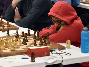 Eleven-year-old Adithya Vaidyanathan – who won the top Open section – ponders his move in the final round.