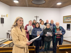 Supporting image for story: Meet the teenage conductor keeping Wolverhampton choir veterans in tune despite huge age gap