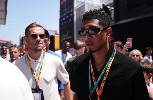 Real Madrid's Jude Bellingham, right, with former Liverpool man Jordan Henderson, casting their eye over the paddock in Barcelona. (PA)