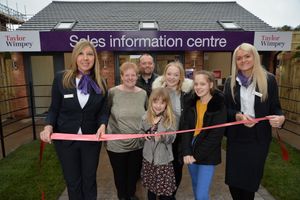 Isobel with her parents Alison and Richard Hickman, sisters Catherine and Emily, and Taylor Wimpey sales executives Sam Banks and Molly Stephens
